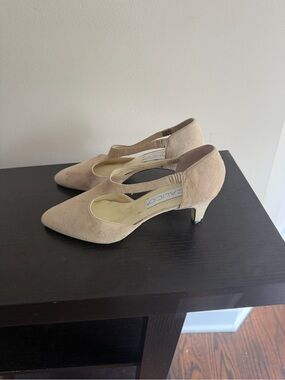 Calico suede pumps with pointed toes and cutout side details